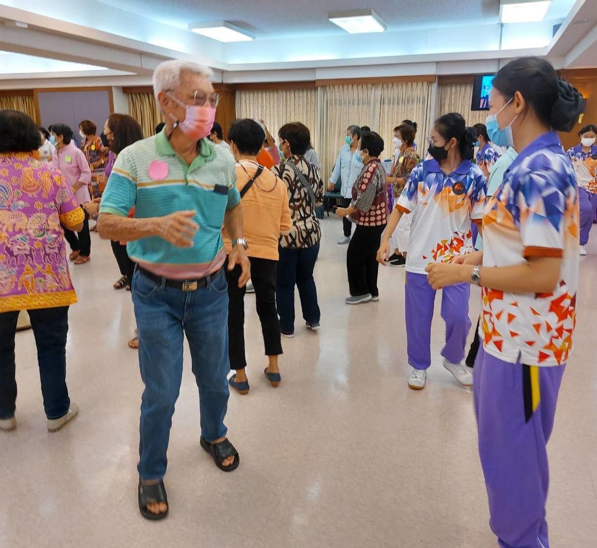 Nursing students gives instruction to the aging group to practice everyday for a better health.