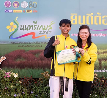 Tanat, BA student winning gold medal in Thailand University Games 49th.